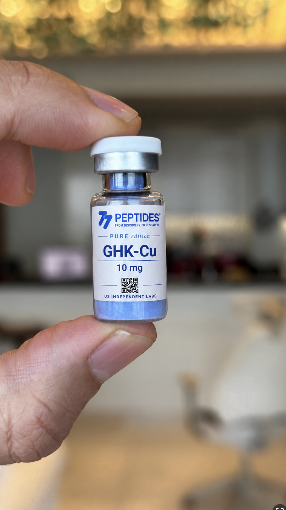 GHK-Cu 10 mg vial held in hand