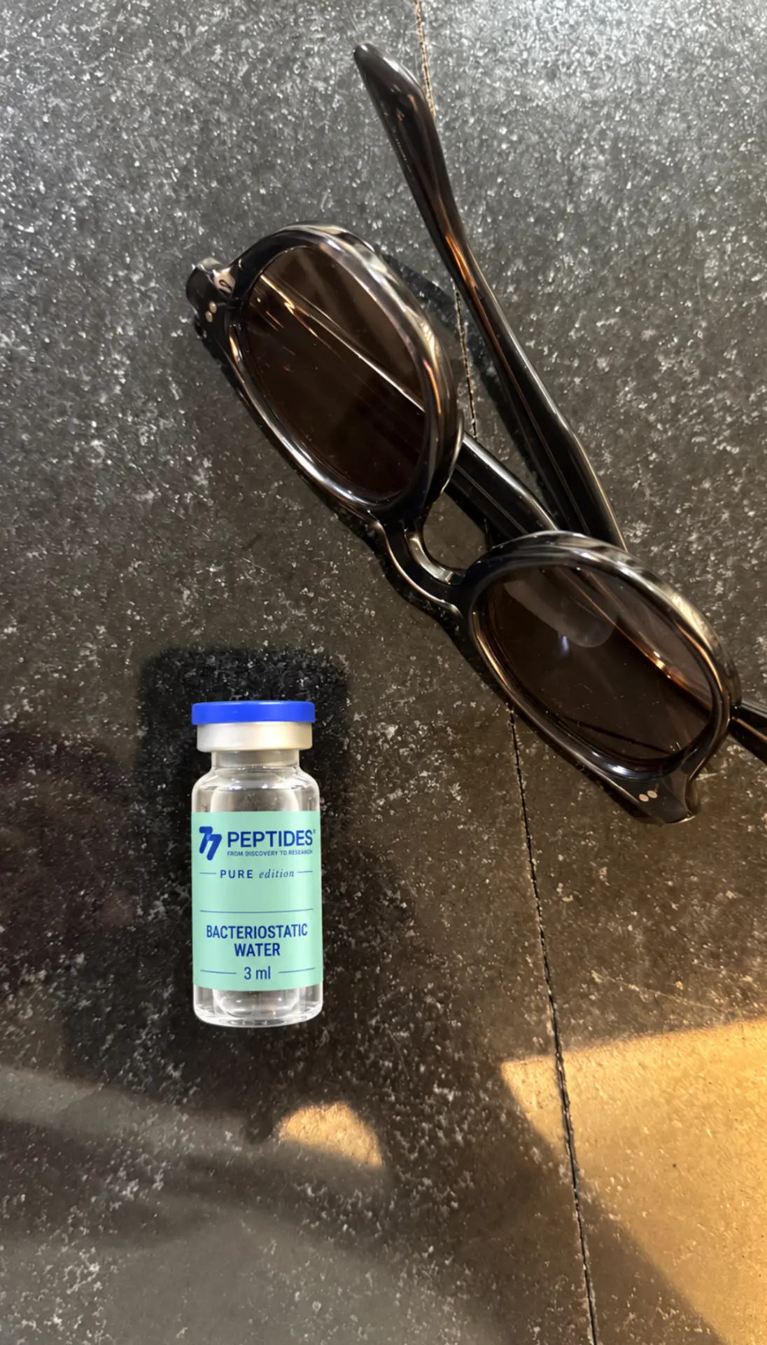 Bacteriostatic Water 3 ml vial on a stone countertop